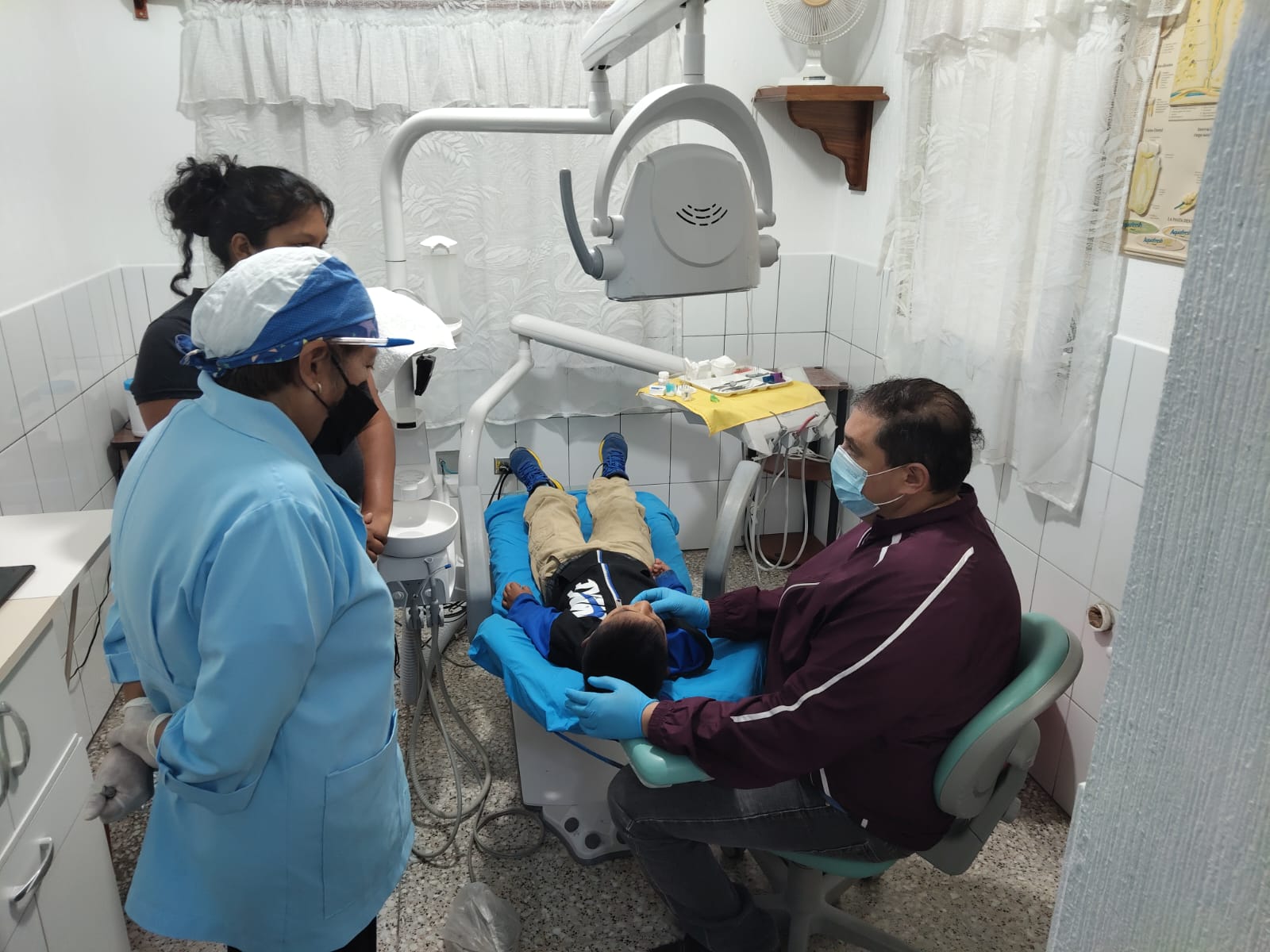 Dr. Angel Alonzo caring for patients at Clinic Daniel Comboni AMICASI