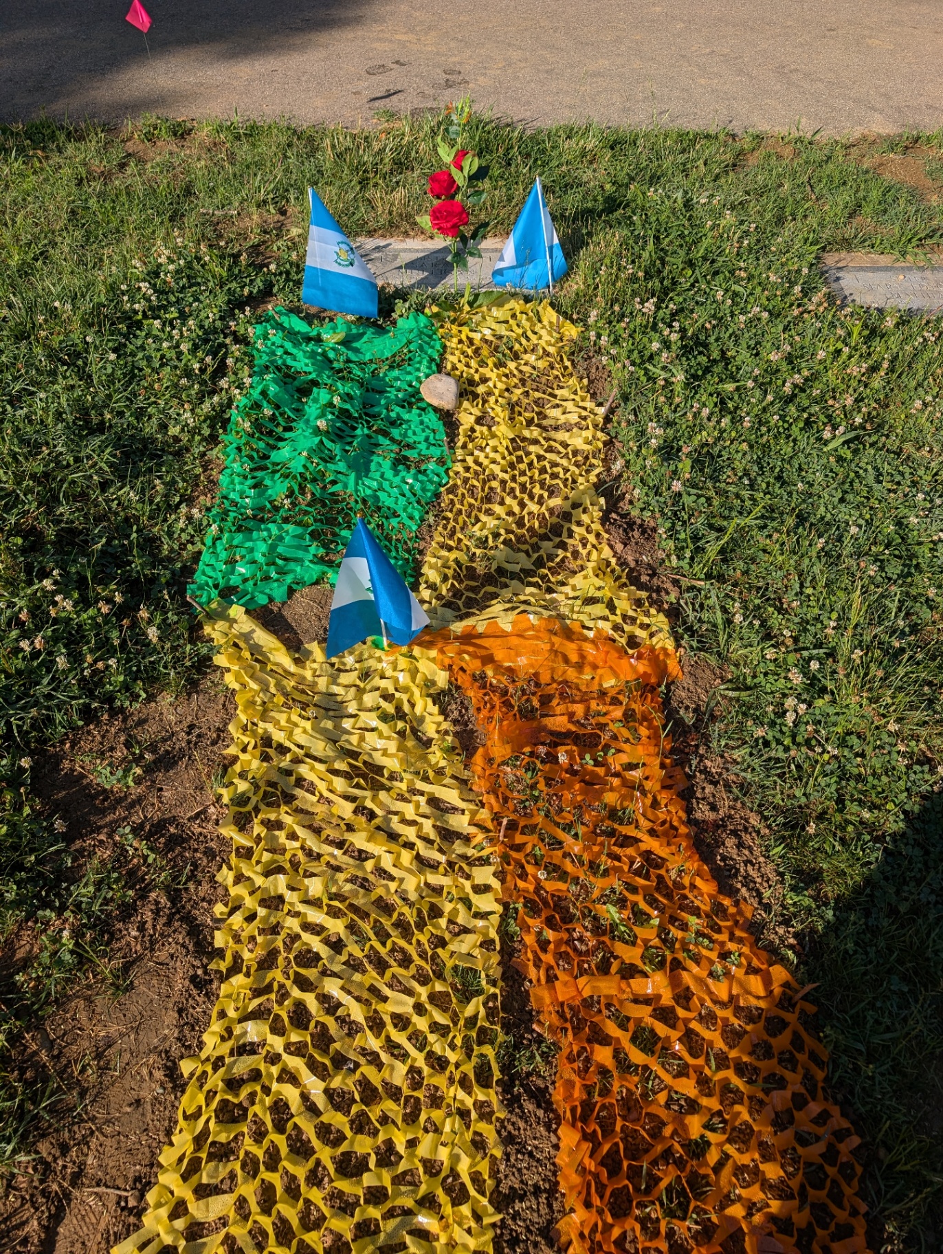Green, yellow and orange tribute with Guatemalan flags