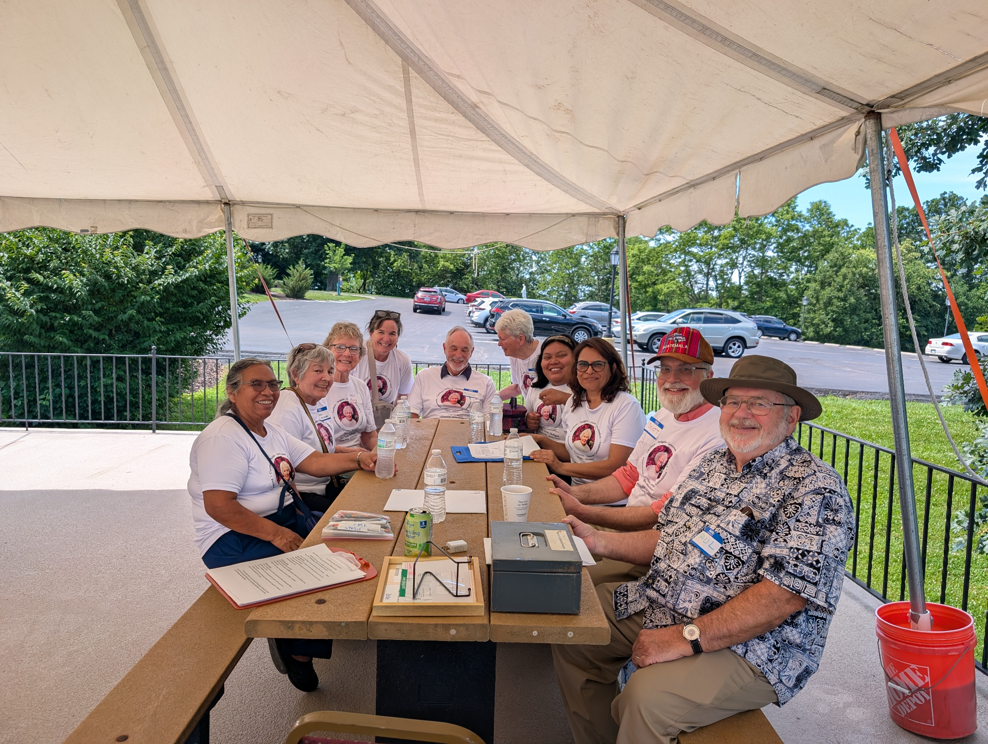 Volunteers gathered at the Mission Walk 2026 registration tent